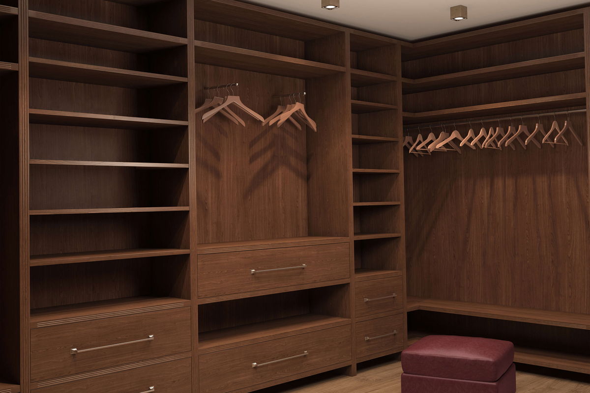 custom closet made out of wood cabinets